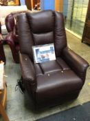 A leather rise and recliner armchair