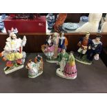 Collection of Staffordshire flat back figures