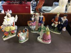 Collection of Staffordshire flat back figures