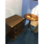A small oak chest of drawers and an Italian style table