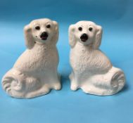 A pair of Staffordshire dogs, with glass eyes