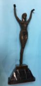 A reproduction Chiparus model of a Dancer with her arms aloft, 64cm high