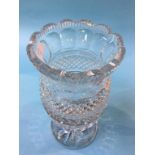 A large heavy cast glass flower vase