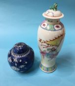 A Chinese baluster shaped vase and cover, decorated with Warriors, 33cm high and a Chinese blue