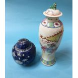 A Chinese baluster shaped vase and cover, decorated with Warriors, 33cm high and a Chinese blue