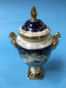 A Coalport vase and cover, decorated by P. Graves, to commemorate the Queen's Silver Jubilee, boxed