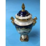 A Coalport vase and cover, decorated by P. Graves, to commemorate the Queen's Silver Jubilee, boxed