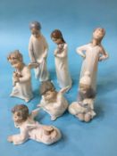 Five Lladro figures and two others