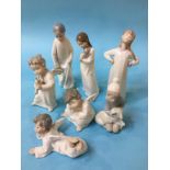 Five Lladro figures and two others