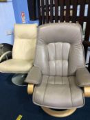 Two leather swivel chairs