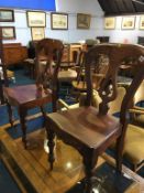 Two mahogany solid seat chairs