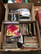 Two boxes of 45s singles