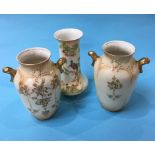 A garniture of three Crown Devon vases