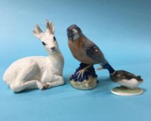 A Royal Copenhagen bird, numbered 1235, a deer, numbered 22607 and a Rosenthal duck, numbered 171 (