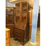 An oak bureau bookcase