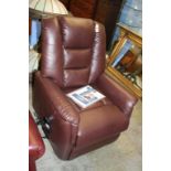 A burgundy leather rise and recliner