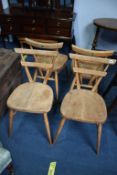 A set of four Ercol Lucian Erolani chairs