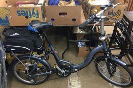 A Shimano Basis folding electric bike, with charge