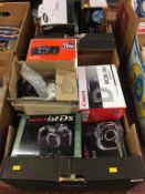 Quantity of digital cameras, in two boxes