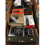 Quantity of digital cameras, in two boxes