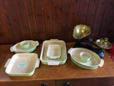 Quantity of Le Creuset stoneware and a set of scales