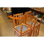 Teak dining table and four chairs