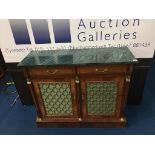 A marble top Regency style two door side cabinet