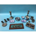 Various pewter measures, pair of candlesticks, framed tile etc.