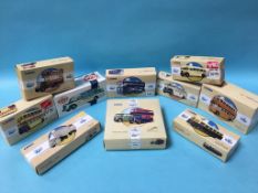 Ten boxed Die Cast buses