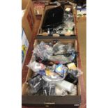 Two trays of various leads, camera accessories and