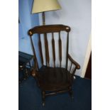 Brass standard lamp and rocking chair