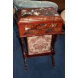 A Japanese lacquered sewing box, inlaid with mother of pearl