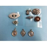 Collection of various silver brooches and medallions etc.