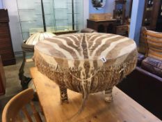 A zebra skin drum