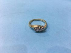 An 18ct gold and diamond ring, 3.8g
