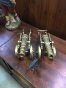 Pair of brass canons etc.