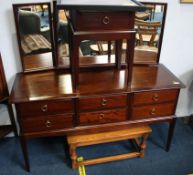 Stag dressing table, bedside drawers and an oak co