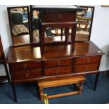 Stag dressing table, bedside drawers and an oak co