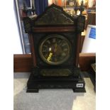 A Victorian slate mantel clock