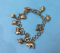 A 9ct gold charm bracelet, 17.7g