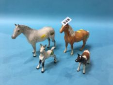 Three Beswick horses and a calf