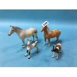 Three Beswick horses and a calf