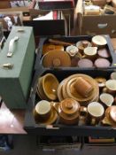 Two boxes Hornsea 'Saffron' dinnerware and picnic set