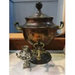 A copper samovar and one other