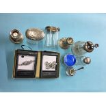 Collection of silver top bottles, candlesticks etc.