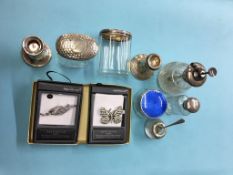 Collection of silver top bottles, candlesticks etc.