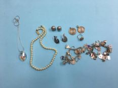 Silver charm bracelet etc.