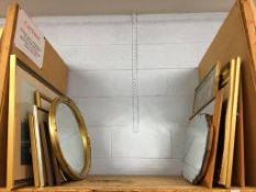 Quantity mirrors and pictures on one shelf