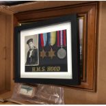 Framed H.M.S. Hood pictures and medals, etc.