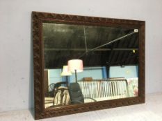 Mirror with carved frame